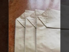 白い編まれたポリプロピレンの砂は空の砂利袋50KGをリサイクルすることを袋に入れる